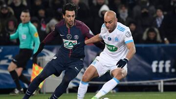 Marseille&#039;s Tunisian defender Aymen Abdennour (R) vies for the ball with Paris Saint-Germain&#039;s Argentinian midfielder Javier Pastore during the French Cup quarter-final football match between Paris Saint-Germain (PSG) and Marseille (OM) at the P