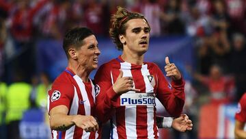 Fernando Torres y Griezmann celebran el gol del francés al Leicester.
