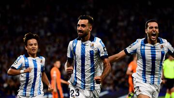 Real Sociedad's Spanish midfielder #23 Brais Mendez celebrates with teammates after scoring his team's first goal during the UEFA Champions League 1st round day 1 group D football match between Real Sociedad and Inter Milan at the Reale Arena stadium in San Sebastian on September 20, 2023. (Photo by ANDER GILLENEA / AFP)