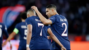 PARIS, FRANCE - OCTOBER 11: Kylian Mbappe of Paris Saint Germain celebrating 1-0 with Achraf Hakimi of Paris Saint Germain during the UEFA Champions League match between Paris Saint Germain v Benfica at the Parc des Princes on October 11, 2022 in Paris France (Photo by David S. Bustamante/Soccrates/Getty Images)
