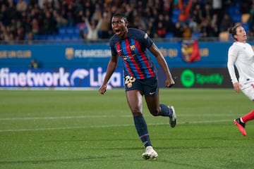 Oshoala celebrates as she scores against Sevilla.