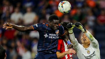 Sep 21, 2022; Cincinnati, OH, USA; Club Deportivo Guadalajara goalkeeper Raul Rangel (27) makes a save against FC Cincinnati forward Dominique Badji (14) in the first half at TQL Stadium. Mandatory Credit: Katie Stratman-USA TODAY Sports