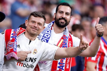 Aficionados del Atlético de Madrid y Real Madrid en el estadio Cívitas Metropolitano.