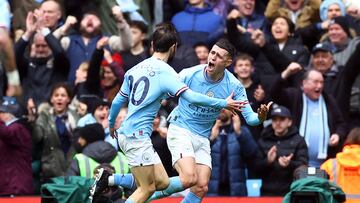 Soccer Football - Premier League - Manchester City v Newcastle United - Etihad Stadium, Manchester, Britain - March 4, 2023 Manchester City's Bernardo Silva celebrates scoring their second goal with Phil Foden REUTERS/Carl Recine EDITORIAL USE ONLY. No use with unauthorized audio, video, data, fixture lists, club/league logos or 'live' services. Online in-match use limited to 75 images, no video emulation. No use in betting, games or single club /league/player publications.  Please contact your account representative for further details.