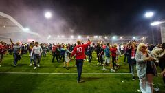 Nottingham Forest fans celebrate on the pitch after they reach the play off final during the Sky Bet Championship play-off semi-final, second leg match at the City Ground, Nottingham. Picture date: Tuesday May 17, 2022. (Photo by Zac Goodwin/PA Images via Getty Images)