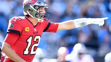 CHARLOTTE, NORTH CAROLINA - OCTOBER 23: Tom Brady #12 of the Tampa Bay Buccaneers directs the offense in the fourth quarter against the Carolina Panthers at Bank of America Stadium on October 23, 2022 in Charlotte, North Carolina.   Eakin Howard/Getty Images/AFP