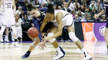 COLUMBUS, OH - MARCH 30: Kathryn Westbeld #33 of the Notre Dame Fighting Irish battles for the ball with Azura Stevens #23 of the Connecticut Huskies during the second half in the semifinals of the 2018 NCAA Women's Final Four at Nationwide Arena on