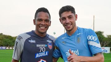 Federico Valverde junto a Carlos Bacca en la sede deportiva de Junior