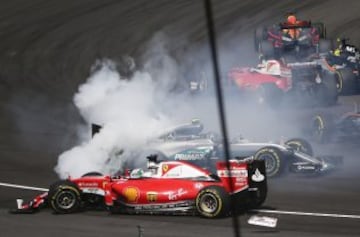 Accidente entre Vettel y Rosberg.