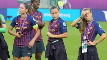 Barcelona&#039;s players react after the UEFA Women&#039;s Champions League final football match Lyon v Barcelona in Budapest on May 18, 2019. (Photo by Tobias SCHWARZ / AFP)