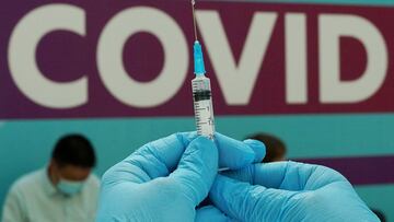 FILE PHOTO: A healthcare worker prepares a dose of Sputnik V (Gam-COVID-Vac) vaccine against the coronavirus disease (COVID-19) at a vaccination centre in Gostiny Dvor in Moscow, Russia July 6, 2021. REUTERS/Tatyana Makeyeva/File Photo