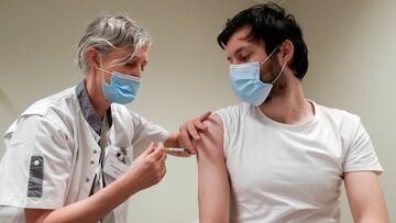 FILE PHOTO: A volunteer receives a dose of CureVac vaccine or a placebo during a study by the German biotech firm CureVac as part of a testing for a new vaccine against the coronavirus disease (COVID-19), in Brussels, Belgium March 2, 2021. REUTERS/Yves Herman/File Photo