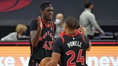 Toronto Raptors forward Pascal Siakam (43) celebrates with guard Norman Powell (24) after the team defeated the Philadelphia 76ers during an NBA basketball game Sunday, Feb. 21, 2021, in Tampa, Fla. (AP Photo/Chris O&#039;Meara)