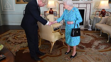 LONDON, ENGLAND - JULY 24: Queen Elizabeth II welcomes newly elected leader of the Conservative party, Boris Johnson during an audience where she invited him to become Prime Minister and form a new government in Buckingham Palace on July 24, 2019 in London, England. The British monarch remains politically neutral and the incoming Prime Minister visits the Palace to satisfy the Queen that they can form her government by being able to command a majority, holding the greater number of seats, in Parliament. Then the Court Circular records that a new Prime Minister has been appointed. (Photo by Victoria Jones - WPA Pool/Getty Images)