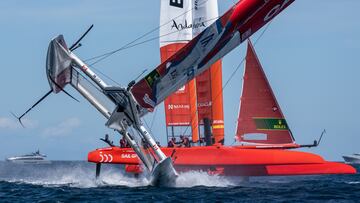 Canada SailGP Team helmed by Phil Robertson nearly capsize as Spain SailGP Team helmed by Jordi Xammar sail closely past during the second race on Race Day 1 of the Range Rover France Sail Grand Prix in Saint Tropez, France. 10th September 2022. Photo: Bob Martin for SailGP. Handout image supplied by SailGP