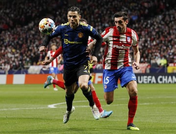 Cristiano Ronaldo y Stefan Savic.