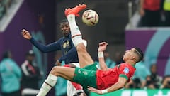 AL KHOR, QATAR - DECEMBER 14: Ousmane Dembele (L) of France fights for the ball with Jawad El Yamiq (R) of Morocco during the FIFA World Cup Qatar 2022 semi final match between France and Morocco at Al Bayt Stadium on December 14, 2022 in Al Khor, Qatar. (Photo by Khalil Bashar/Jam Media/Getty Images)