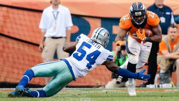 Sep 17, 2017; Denver, CO, USA; Dallas Cowboys outside linebacker Jaylon Smith (54) defends against Denver Broncos running back C.J. Anderson (22) in the fourth quarter at Sports Authority Field at Mile High. Mandatory Credit: Isaiah J. Downing-USA TODAY Sports