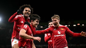 Manchester United's English defender #05 Harry Maguire (2L) celebrates scoring the team's second goal during the English FA Cup fourth round football match between Manchester United and Leicester City at Old Trafford in Manchester, north west England, on February 7, 2025. (Photo by Oli SCARFF / AFP) / RESTRICTED TO EDITORIAL USE. No use with unauthorized audio, video, data, fixture lists, club/league logos or 'live' services. Online in-match use limited to 120 images. An additional 40 images may be used in extra time. No video emulation. Social media in-match use limited to 120 images. An additional 40 images may be used in extra time. No use in betting publications, games or single club/league/player publications. /