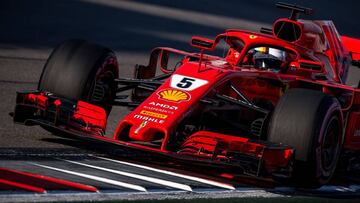 Ferrari&#039;s German driver Sebastian Vettel steers his car during the qualifying session for the Formula One Russian Grand Prix at the Sochi Autodrom circuit in Sochi on September 29, 2018. (Photo by ANDREJ ISAKOVIC / AFP)