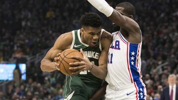 Mar 17, 2019; Milwaukee, WI, USA; Milwaukee Bucks forward Giannis Antetokounmpo (34) moves to the basket against Philadelphia 76ers forward James Ennis III (11) during the second quarter at Fiserv Forum. Mandatory Credit: Jeff Hanisch-USA TODAY Sports