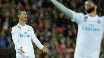 Real Madrid's Portuguese forward Cristiano Ronaldo reacts during the Spanish league football match Athletic Club Bilbao vs Real Madrid CF at the San Mames stadium in Bilbao on December 2, 2017. / AFP PHOTO / ANDER GILLENEA
