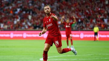 SINGAPORE, SINGAPORE - JULY 15: Jordan Henderson #14 of Liverpool celebrates after scoring his team's first goal against Crystal Palace during the first half of their preseason friendly at the National Stadium on July 15, 2022 in Singapore. (Photo by Yong Teck Lim/Getty Images)