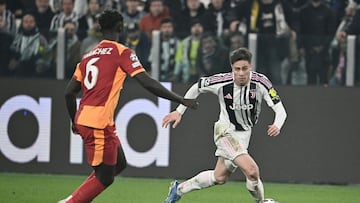 Juventus� Turkish forward #10 Kenan Yildiz dribbles past Galatasaray�s Colombian defender #6 Davinson Sanchez during the UEFA Champions League, knockout round play-off second leg, football match between Juventus FC and Galatasaray SK at the Allianz stadium in Turin, on February 25, 2026. (Photo by Isabella BONOTTO / AFP)