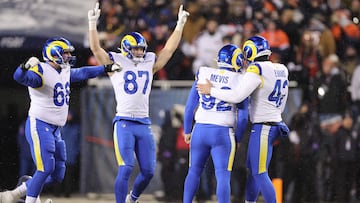 CHICAGO, ILLINOIS - JANUARY 18: Harrison Mevis #92 of the Los Angeles Rams celebrates with Ethan Evans #42 after kicking the game winning field goal against the Chicago Bears during overtime in the NFC Divisional Playoffs at Soldier Field on January 18, 2026 in Chicago, Illinois. Michael Reaves/Getty Images/AFP (Photo by Michael Reaves / GETTY IMAGES NORTH AMERICA / Getty Images via AFP)