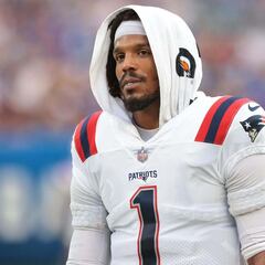 Cam Newton returns to Carolina to “win football games”