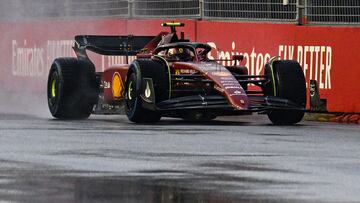 Ferrari's Spanish driver Carlos Sainz Jr drives during a practice session ahead of the Formula One Singapore Grand Prix night race at the Marina Bay Street Circuit in Singapore on October 1, 2022. (Photo by Lillian SUWANRUMPHA / AFP)