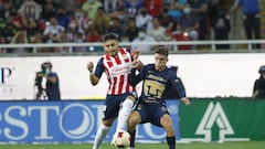 (L-R); Alexis Vega of Guadalajara and Santiago Trigos of Pumas  during the game Guadalajara vs Pumas UNAM, corresponding to day 16 of the Torneo Clausura Grita Mexico C22 of Liga BBVA MX, at Akron Stadium, on April 23, 2022.

<br><br>

(I-D); Alexis Vega de Guadalajara y Santiago Trigos de Pumas durante el partido Guadalajara vs Pumas UNAM, correspondiente a la jornada 16 del Torneo Clausura Grita Mexico C22 de la Liga BBVA MX, en el Estadio Akron, el 23 de Abril de 2022.