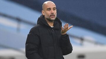 Manchester City&#039;s Spanish manager Pep Guardiola gestures on the touchline during the English FA Cup third round football match between Manchester City and Birmingham City at the Etihad Stadium in Manchester, north west England, on January 10, 2021. (