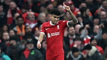 Liverpool's Colombian midfielder #07 Luis Diaz gestures to the official after his goal was rouled out for an offside during the English Premier League football match between Liverpool and Manchester City at Anfield in Liverpool, north west England on March 10, 2024. (Photo by Paul ELLIS / AFP) / RESTRICTED TO EDITORIAL USE. No use with unauthorized audio, video, data, fixture lists, club/league logos or 'live' services. Online in-match use limited to 120 images. An additional 40 images may be used in extra time. No video emulation. Social media in-match use limited to 120 images. An additional 40 images may be used in extra time. No use in betting publications, games or single club/league/player publications. / 