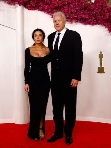 El actor Tim Robbins y Gratiela Brancusi.