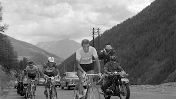 (FILES) (From R) Belgian racing cyclist Rik Van Looy, Italian racing cyclist Graziano Battistini and French racing cyclist Jean Dotto breakaway on the Le Grand Saint-Bernard as they compete in the Tour de France, in Saint-Bernard, near Chamonix, southeastern France, on July 10, 1963. Belgian rider Rik Van Looy, considered one of the greatest riders in history and winner of every cycling landmark, died at the age of 90, several Belgian media reported on December 18, 2024. (Photo by AFP)