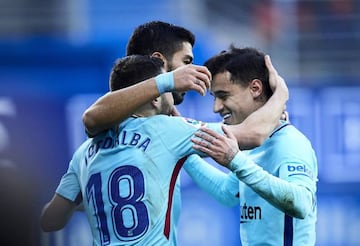 Alba of FC Barcelona celebrates with his teammates Philippe Coutinho and Luis Suarez of FC Barcelona after scoring his team's second goal during the La Liga match between SD Eibar and FC Barcelona