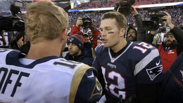FILE- In this Dec. 4, 2016, file photo, New England Patriots quarterback Tom Brady right, speak at midfield to Los Angeles Rams quarterback Jared Goff after the Patriots won 26-10 in an NFL football game in Foxborough, Mass. The wide-eyed, talented Goff will try to lead his Rams past the grizzled, 41-year-old Brady, who is looking to guide the Patriots to their sixth Super Bowl victory. (AP Photo/Steven Senne, File)