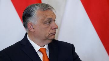 Hungarian Prime Minister Viktor Orban looks on as he and Hungarian President Janos Ader give a statement to the media after their talks at the Presidential Palace in Budapest, Hungary, April 29, 2022. REUTERS/Bernadett Szabo