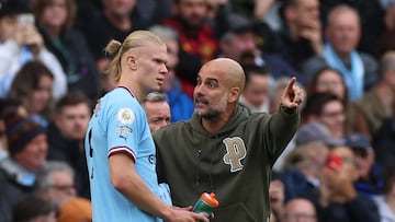 Pep Guardiola and Erling Haaland