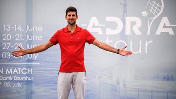 (FILES) In this file photo taken on May 25, 2020 Serbian tennis player Novak Djokovic (ATP Number 1) poses for photographers after a press conference on the upcoming Adria Tour tennis tournament in Belgrade. - Novak Djokovic has also tested positive for coronavirus on June 23, 2020 along with Grigor Dimitrov, Borna Coric and Viktor Troicki, after taking part in an exhibition tennis tournament in the Balkans featuring world number one Novak Djokovic, raising questions over the sport's planned return in August. (Photo by Andrej ISAKOVIC / AFP)