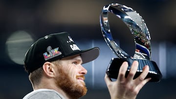 SEATTLE, WASHINGTON - JANUARY 25: Sam Darnold #14 of the Seattle Seahawks celebrates with the George Halas Trophy after defeating the Los Angeles Rams 31-27 in the NFC Championship game at Lumen Field on January 25, 2026 in Seattle, Washington. Ronald Martinez/Getty Images/AFP (Photo by RONALD MARTINEZ / GETTY IMAGES NORTH AMERICA / Getty Images via AFP)