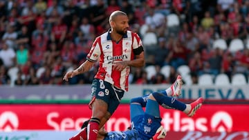 San Luis' Brazilian forward #09 Joao Pedro reacts after scoring his team's first goal past Atlas' Colombian goalkeeper #12 Camilo Vargas during the Liga MX Clausura football match between Atlas and San Luis at the Jalisco Stadium in Guadalajara, state of Jalisco, Mexico, on February 21, 2026. (Photo by Ulises Ruiz / AFP)