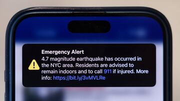 An emergency alert of a magnitude 4.7 earthquake is seen on a cellphone in New York City, U.S., April 5, 2024. REUTERS/Andrew Kelly