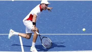 Flushing Meadows (United States), 25/08/2020.- Roberto Bautista Agut of Spain hits a return to Karen Khachanov of Russia during their third round match at the Western and Southern Open at the USTA National Tennis Center in Flushing Meadows, New York, USA, 25 August 2020. Due to the Coronavirus pandemic, the tournament was relocated to NYC to immediately precede the US Open and to be played without fans. (Tenis, Abierto, Rusia, España, Estados Unidos, Nueva York) EFE/EPA/JASON SZENES
