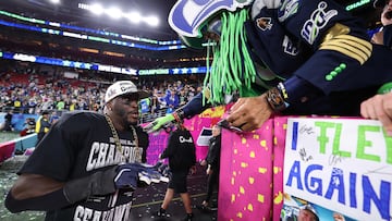 SANTA CLARA, CALIFORNIA - FEBRUARY 08: Derick Hall #58 of the Seattle Seahawks celebrates with fans after winning Super Bowl LX against the New England Patriots at Levi's Stadium on February 08, 2026 in Santa Clara, California. The Seattle Seahawks defeated the New England Patriots 29-13. Kevin C. Cox/Getty Images/AFP (Photo by Kevin C. Cox / GETTY IMAGES NORTH AMERICA / Getty Images via AFP)