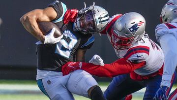 Nov 7, 2021; Charlotte, North Carolina, USA; Carolina Panthers wide receiver D.J. Moore (2) gets tackled by New England Patriots outside linebacker Matt Judon (9) during the second half at Bank of America Stadium. Mandatory Credit: Jim Dedmon-USA TODAY Sp