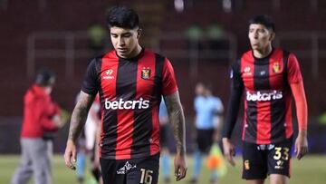 Peru's Melgar Luis Iberico (L) and Matias Lazo leave the field after tying 0-0 with Brazil's Internacional in their Copa Sudamericana football tournament quarterfinals first leg match, at the UNSA Monumental stadium in Arequipa, Peru, on August 4, 2022. (Photo by Diego Ramos / AFP) (Photo by DIEGO RAMOS/AFP via Getty Images)