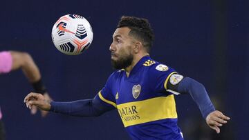 Argentina's Boca Juniors Carlos Tevez eyes the ball during the Copa Libertadores football tournament group stage match between Argentina's Boca Juniors and Bolivia's The Strongest at La Bombonera Stadium in Buenos Aires on May 26, 2021. (Photo by Juan Mabromata / POOL / AFP)