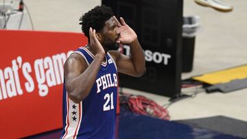 Philadelphia 76ers center Joel Embiid (21) gestures to the crowd after his dunk during the first half of Game 3 in a first-round NBA basketball playoff series against the Washington Wizards, Saturday, May 29, 2021, in Washington. (AP Photo/Nick Wass)